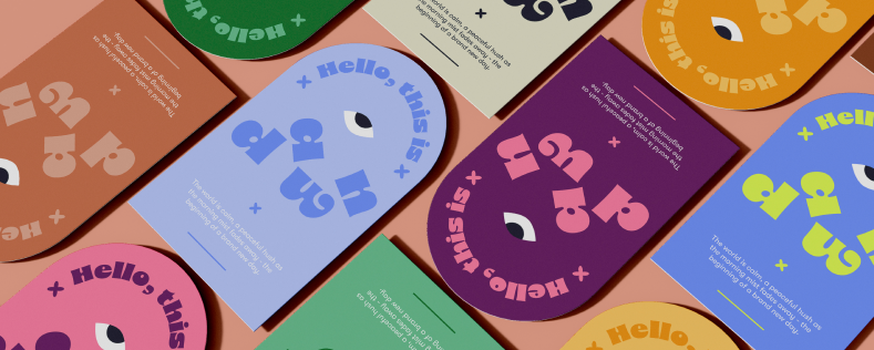 An arrangement of beautifully designed print materials featuring unique fonts and bright colors, shown to debunk the idea that font sourcing doesn’t matter.